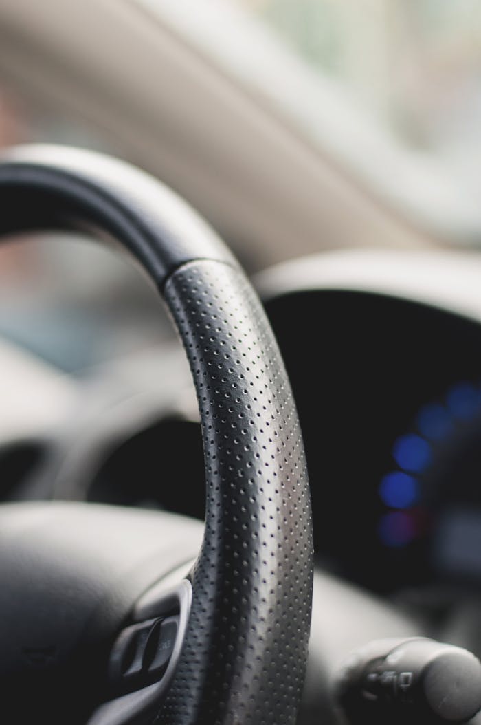 Black Car Steering Wheel Shallow Focus Photography